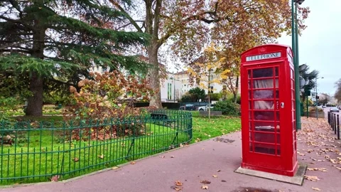 Still shot of red telephone booth on the pedestrian site of Square du Val Stock Footage 326636807