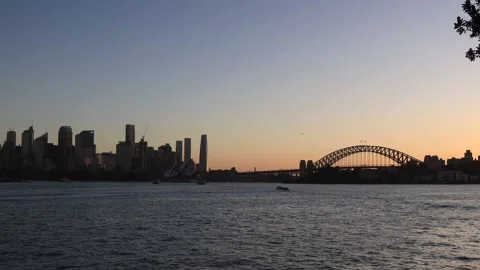 Still sunset over Sydney Harbour waters and distant city CBD skyline Australia Stock Footage 309338495