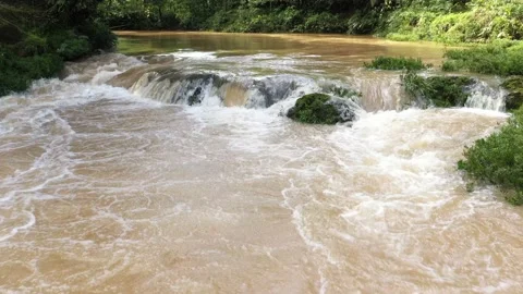 Still video of a small cascade showing the brown water Stock Footage 142760259