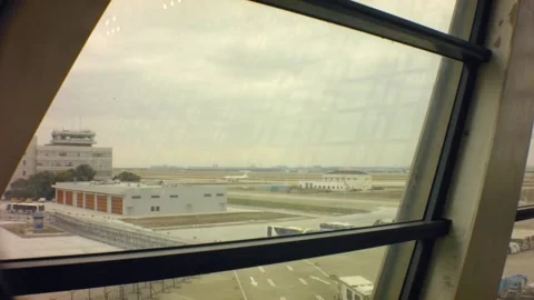 Still view looking out to the apron runway with cranes Stock Footage 157965943