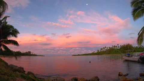 Still view time lapse of sunset at a harbor with reddish pink sky and ocean sea  Stock Footage 235315061