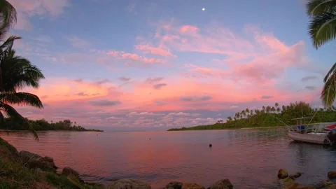 Still view time lapse of sunset at a harbor with reddish pink sky and ocean sea  Stock Footage 235315793