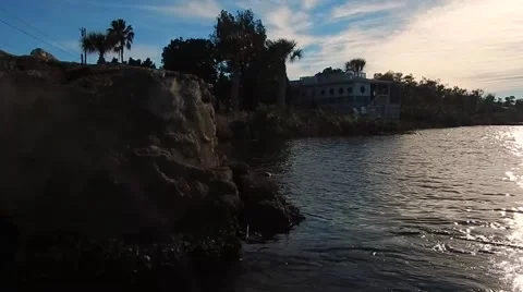Still view of water rippling next to island Vídeos de archivo 45296670