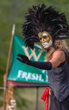 Stilt walker with mask Stock Photos