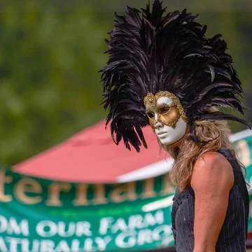 Stilt walker with mask Stock Photos