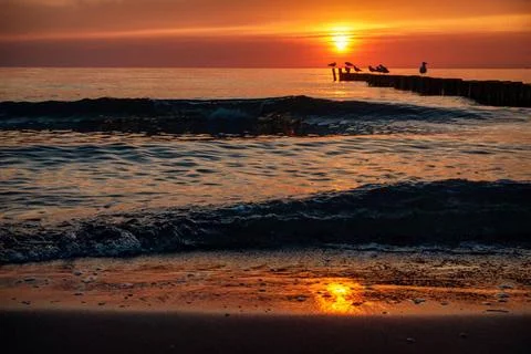 Stimmungsvoller Sonnenuntergang am Ostseestrand Darß Wustrow Stimmungsvoll.. Stock Photos