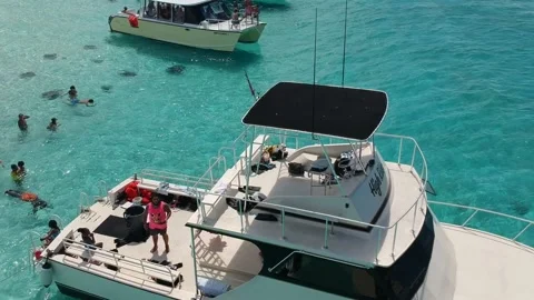Stingray , Cayman islands - 5th March, 2021: Aerial footage person with drone Stock Footage 158177631
