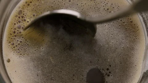 Stir coffee in glass Видео 321378889
