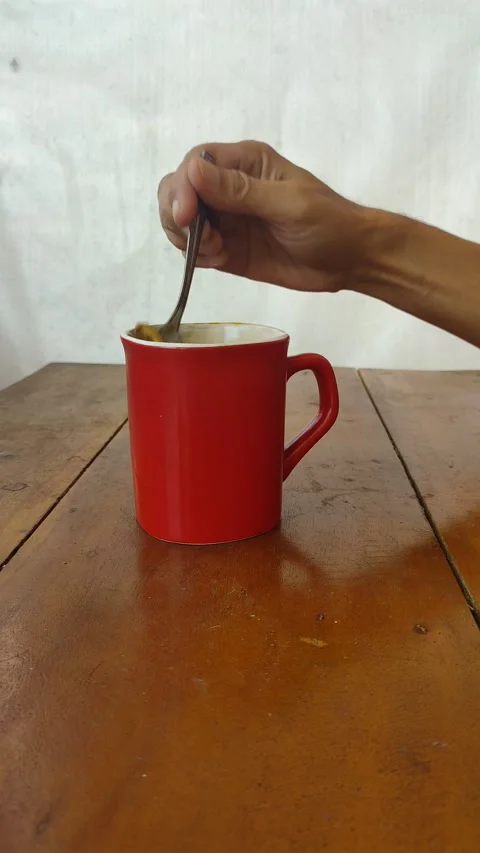 Stir a cup of coffee Stock Footage 279448142