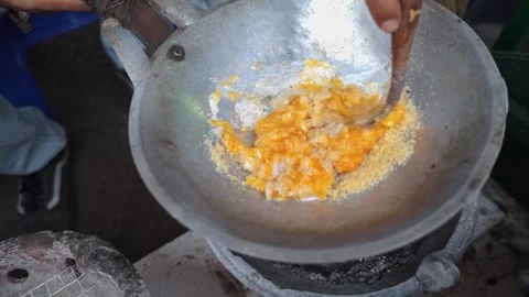 Stir the duck eggs to make the typical Betawi egg crust 스톡 동영상 300621111