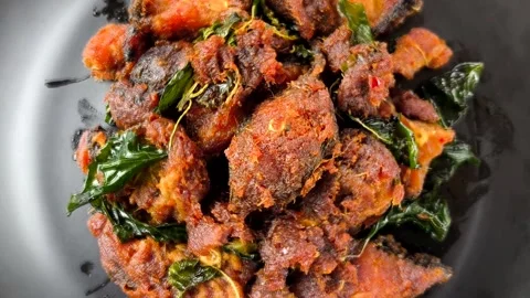 Stir fly spicy catfish Stock Footage 320756578
