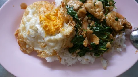 Stir-Fried Basil with rice (Khao Pad Bai Kraprow), Thai food 库存影片 107526072