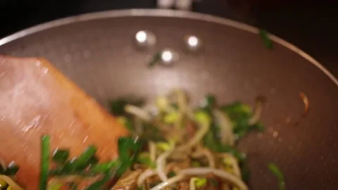 Stir fried bean sprouts and mixed vegetables in non stick pot (6) Stock Footage 202156041