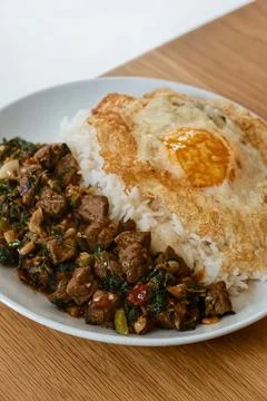 Stir fried beef with basil leaf Stock Photos