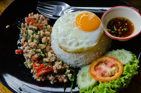 Stir-fried chicken with basil Stock Photos
