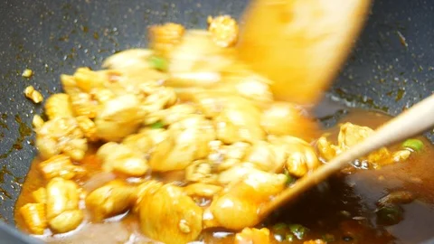 Stir fried chicken with sliced corn and long yard beans,  spices , curry past Stock Footage 89498991