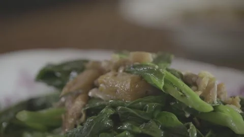 Stir-fried Chinese Broccoli with Salted Fish Stock Footage 336101637