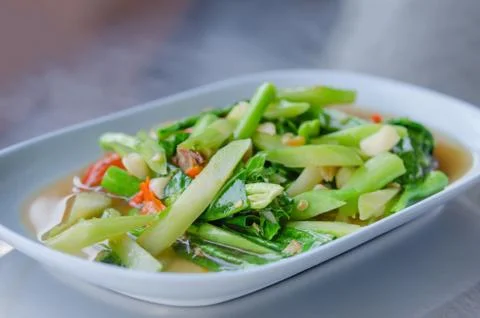Stir fried chinese kale with salted fish 스톡 사진