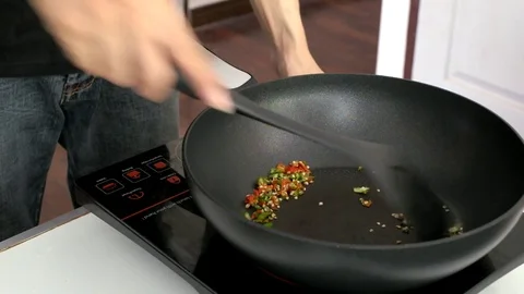 ​ stir fried chopping chili in the kitchen Stock Footage 75007954