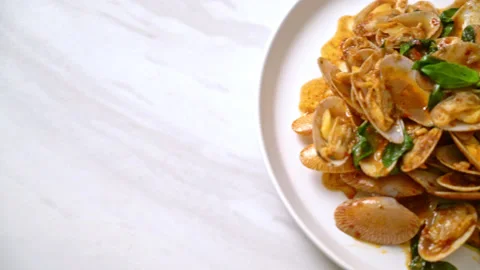 Stir Fried Clams with Roasted Chilli Paste Stock Footage 135137916