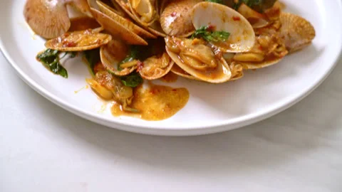 Stir Fried Clams with Roasted Chilli Paste Stock Footage 140755761
