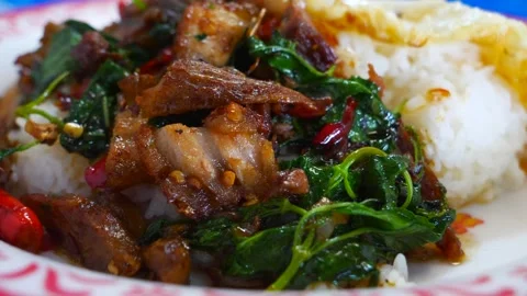 Stir Fried Crispy Pork Belly And Basil With Rice. Popular Thailand Street Food Stock Footage 262867523