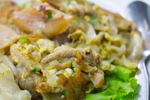 Stir fried flat noodle and chicken and egg Thai street food Stock Photos