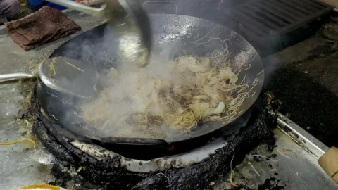 Stir fried flat rice noodle, popular Chinese street food in Penang, Malaysia. Stock Footage 237909357