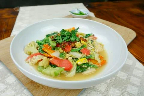 Stir fried fresh vegetable on white plate. close up stir fried vegetable Stock Photos