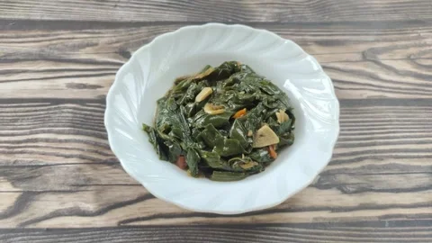 Stir-fried Genjer Vegetables Stock Footage 321376693