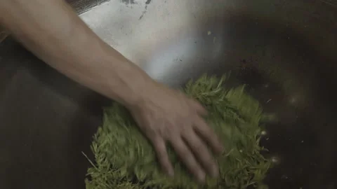 Stir-fried green tea. Stock Footage 172053485