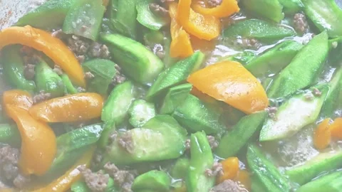 Stir-fried luffa with minced pork on pan. Stock Footage 341865980