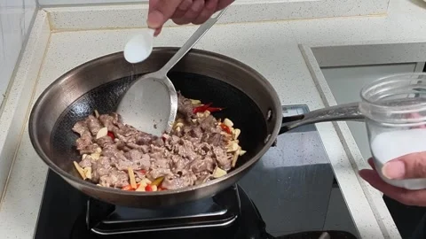 Stir Fried Meat With Chili Being Served Onto Plate Kitchen Vidéo 343293532