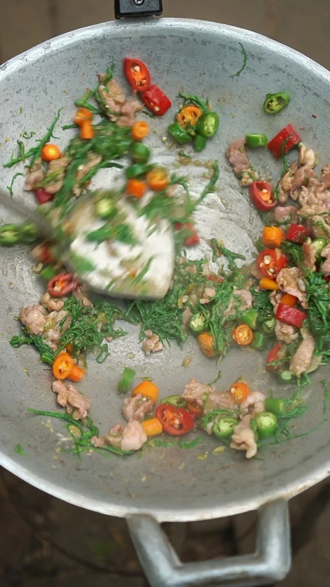 Stir-fried pork with shrimp paste and colorful chilies. Stock Footage 337464356