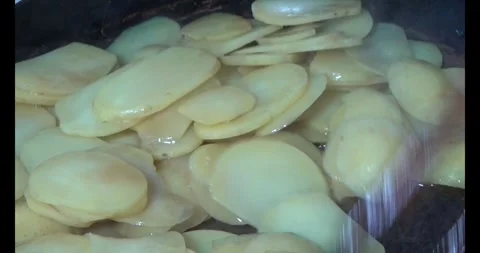 Stir-fried potatoes in a pan Stock Footage 296719069
