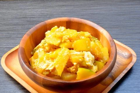 Stir-fried pumpkin with egg Stock Photos