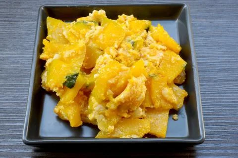 Stir-fried pumpkin with egg Stock Photos