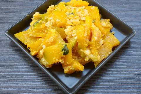 Stir-fried pumpkin with egg Stock Photos