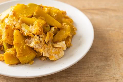 Stir Fried Pumpkin with Egg Stock Photos
