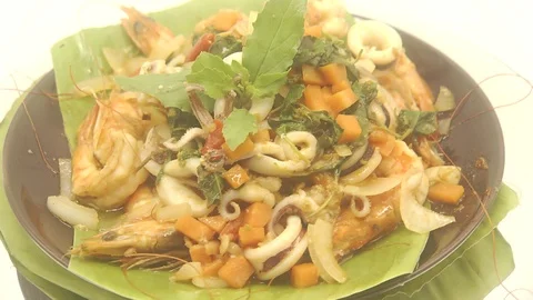 Stir fried seafood with basil Stock Footage 118774595