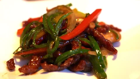 Stir-Fried Shredded Beef with Green Pepper authentic Chinese restaurant Stock Footage 261418247