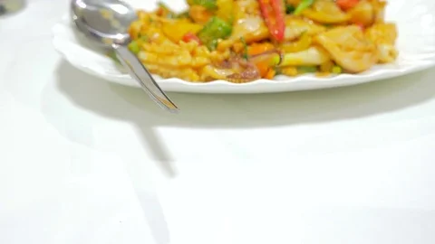 Stir fried squid with curry powder and egg, Thai Traditional Cuisine. Stock Footage