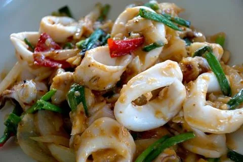 Stir fried squid with salted egg yolk (Thai seafood) Stock Photos