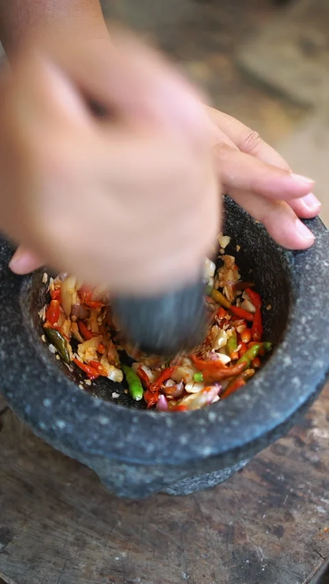 Stir-fried tofu with holy basil in a hot wok. Stock Footage 336195847
