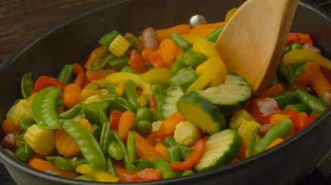 Stir fried vegetables in the pan Stock Footage 61800924