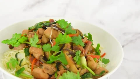 Stir Fry noodle on a turning table with marble background Stock Footage 201248142