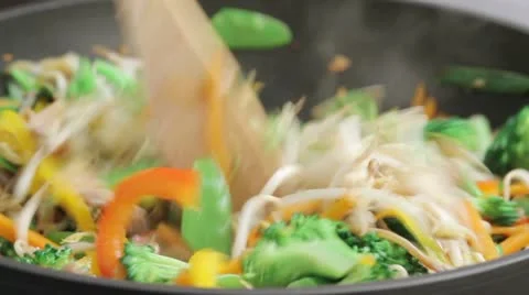 Stir-frying mixed vegetables Stock Footage 24665138