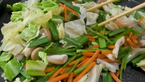 Stir-frying various vegetables Stock Footage 244965981