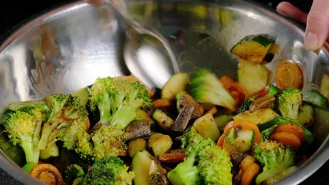 Stir-Frying Vegetables in Cooking Pot Kitchen Scene Stock-Footage 341432145