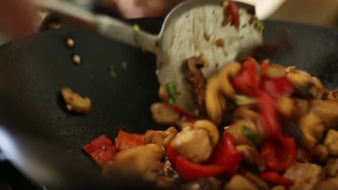 Stir-Frying In A Wok Stock Footage 232970336